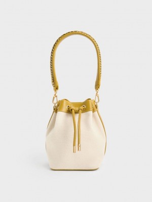 Charles & Keith Braided-Handle Drawstring Bucket Bag Senfgelb | KMLQ40257