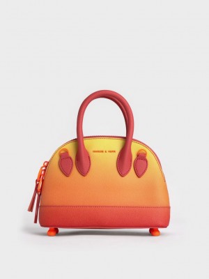 Charles & Keith Harmonee Bowling Bag Sunset | VFOM27139