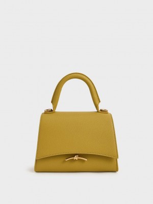 Charles & Keith Huxley Metallic Push-Lock Top Handle Bag Senfgelb | UQYA30285