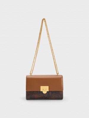 Charles & Keith Snake Print Metallic Accent Clutch Schokolade | XCID78056